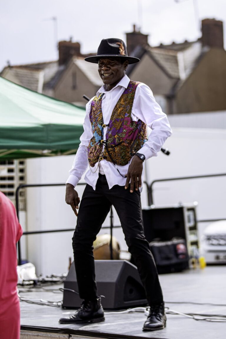 A dancer performing on stage at ZNVA's Zimbabwe Cultural Day